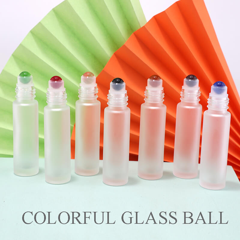 زجاجة مع كرة زجاجية ملونة