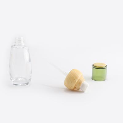 مجموعة زجاجة مستحضرات التجميل الزجاجية الشفافة مع غطاء من الخيزران
