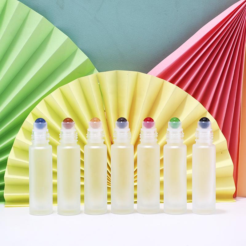 Colorful empty glass roll on bottle