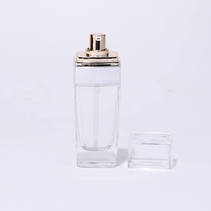 Luxury clear gold pump glass bottle