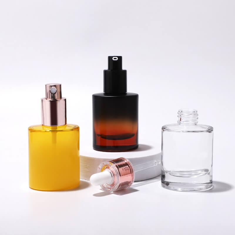 Cosmetic round glass bottle