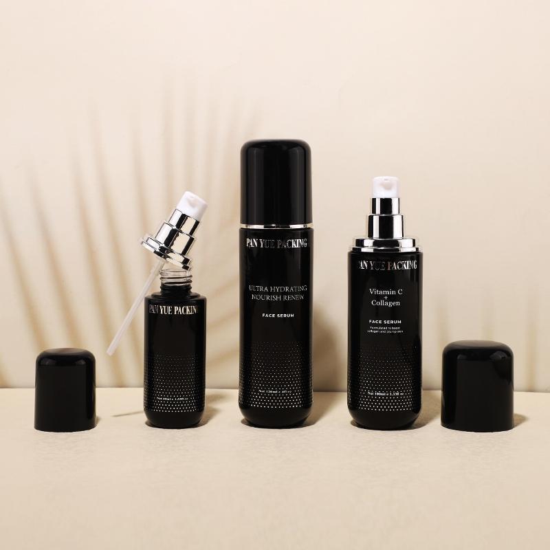 Black capsule glass bottle with lotion pump